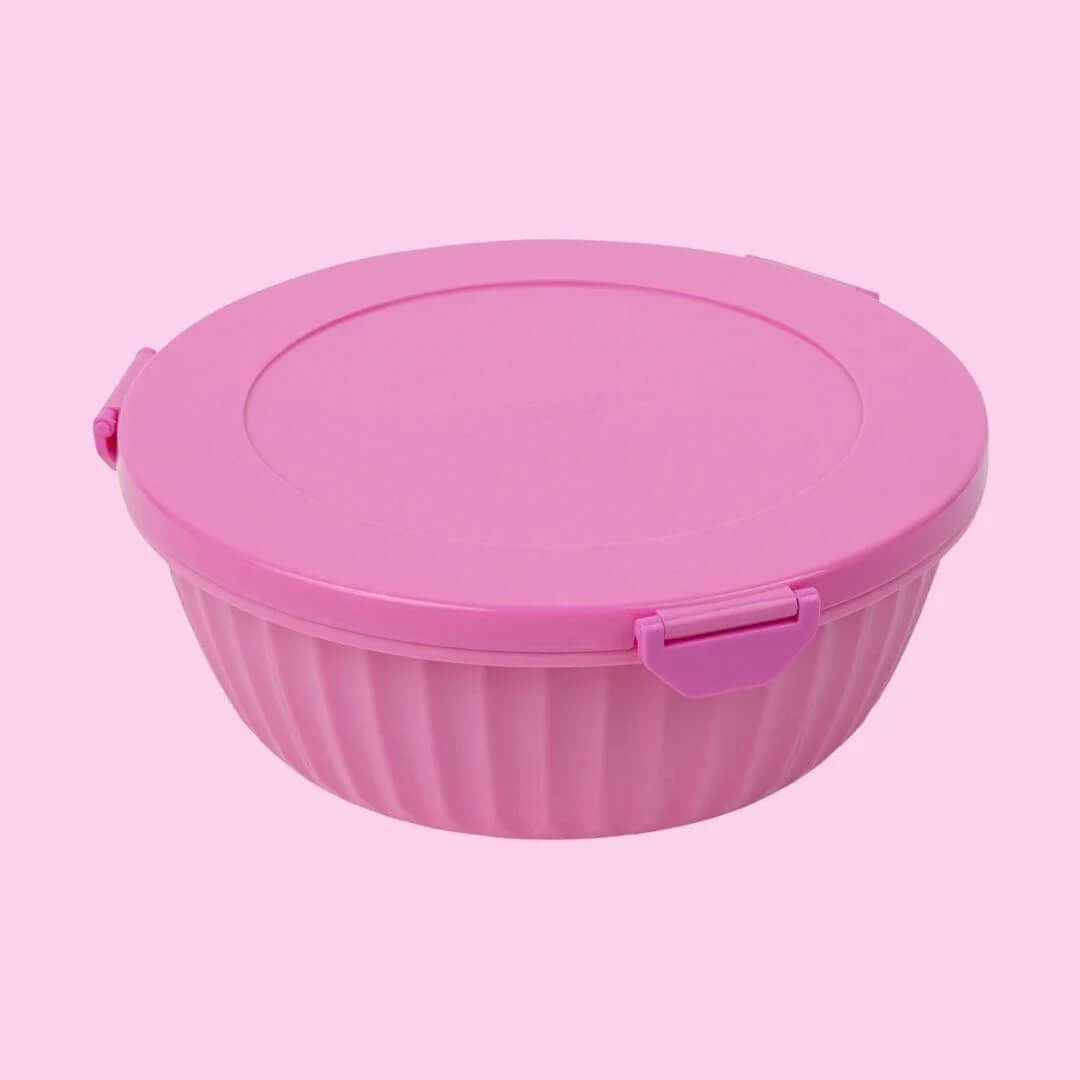 NEW! Yumbox Poke Bowl with 4 Compartment Divider - Various Colours in pink against a pastel background.