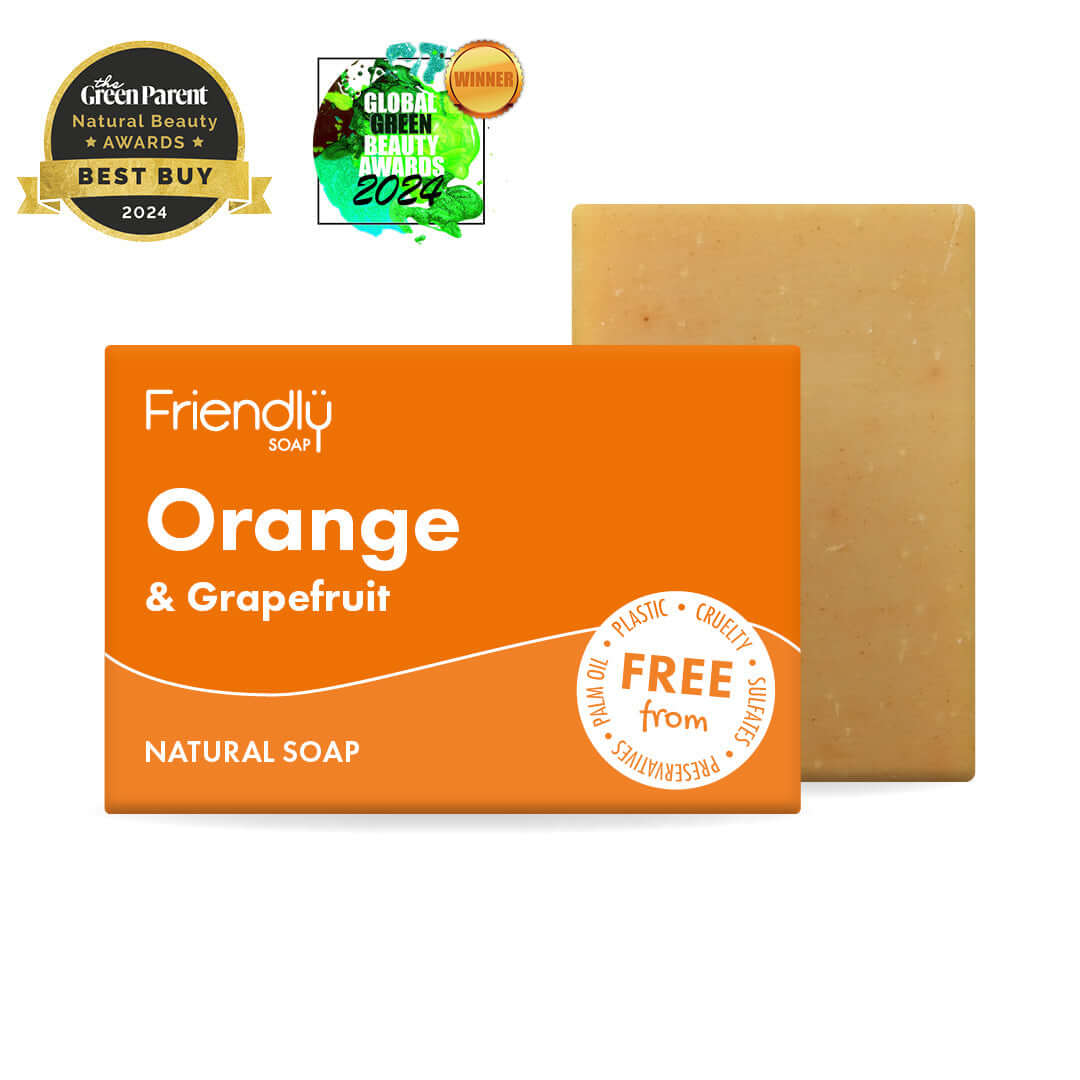 Orange & Grapefruit Natural Soap bar by Friendly Soap, award-winning natural soap, vibrant orange packaging.