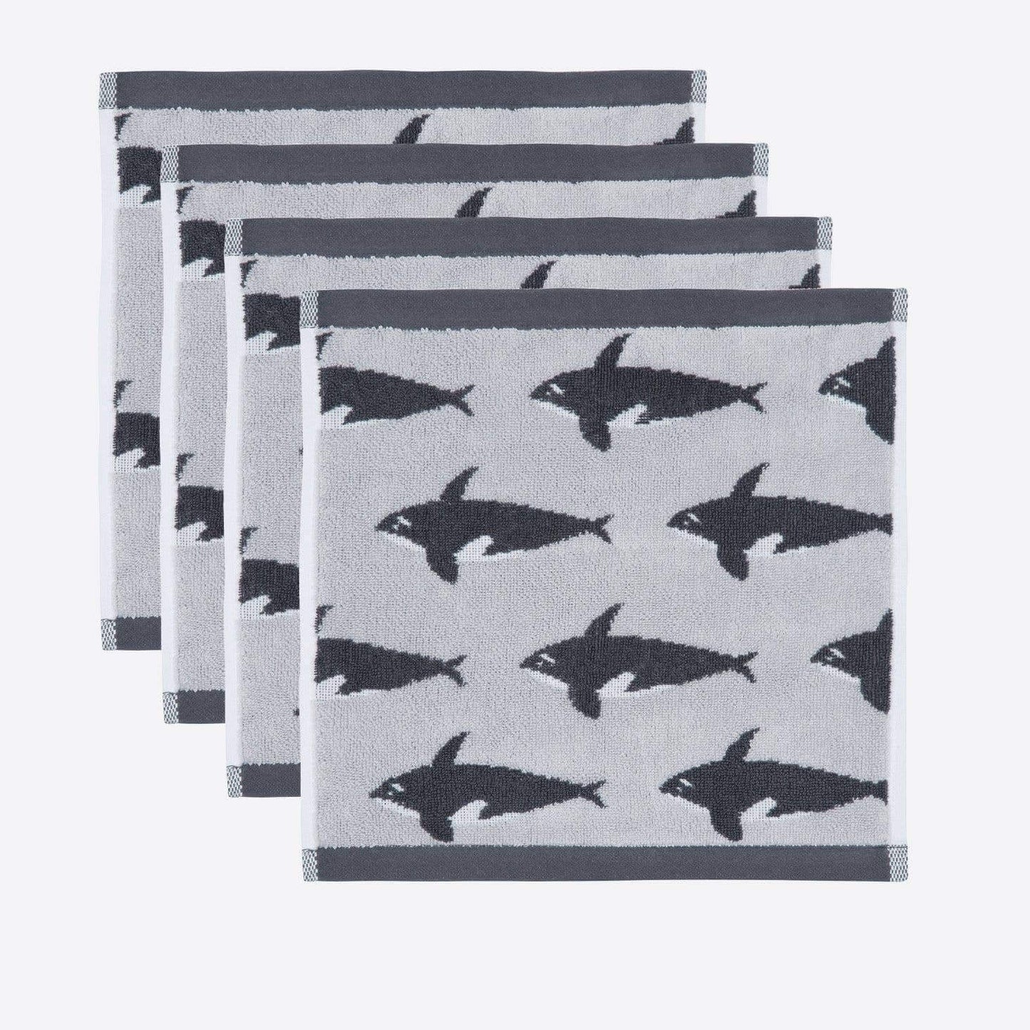 Set of three gray towels with black fish pattern on a white background