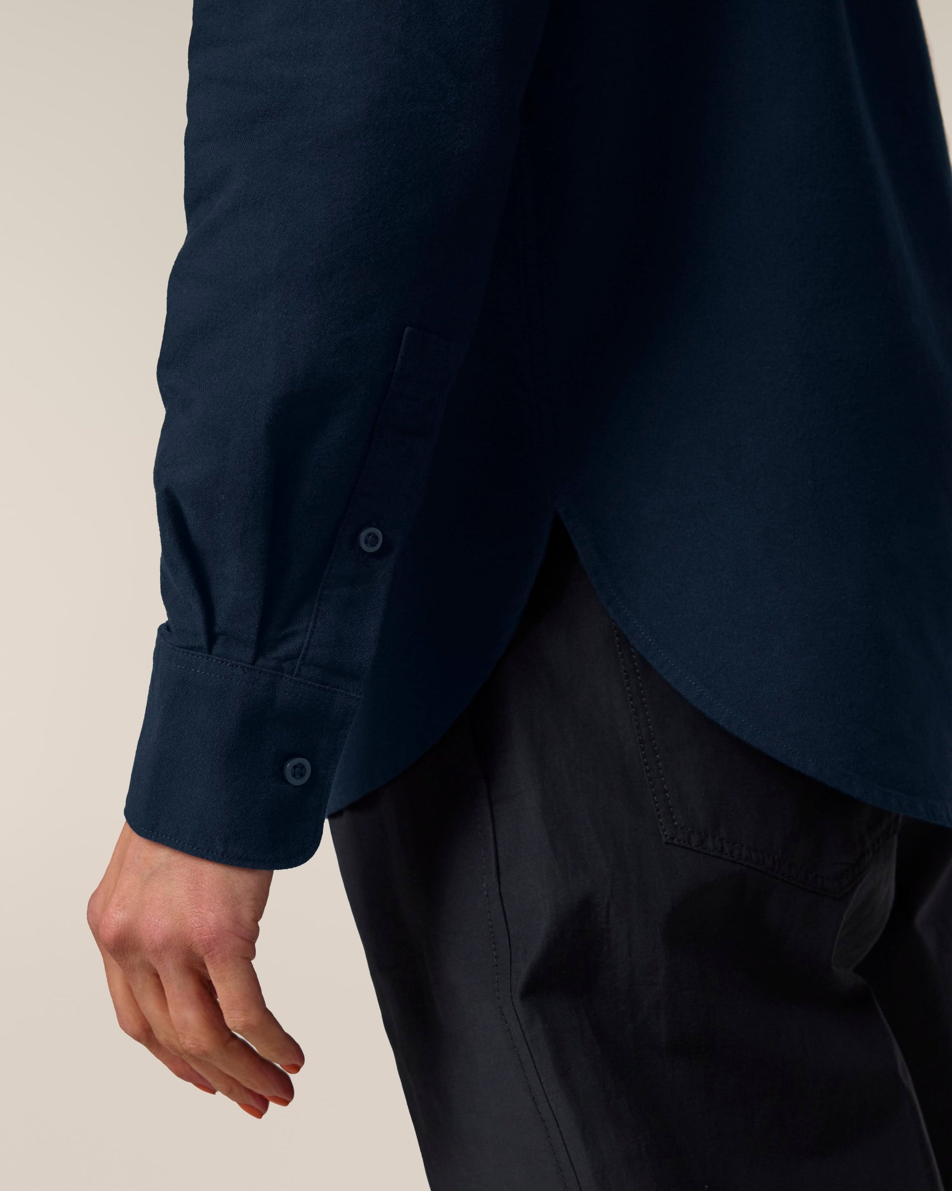 Close-up of the Organic Cotton Oxford Long Sleeve Shirt: Womens showcasing the tailored feminine fit and button detail.