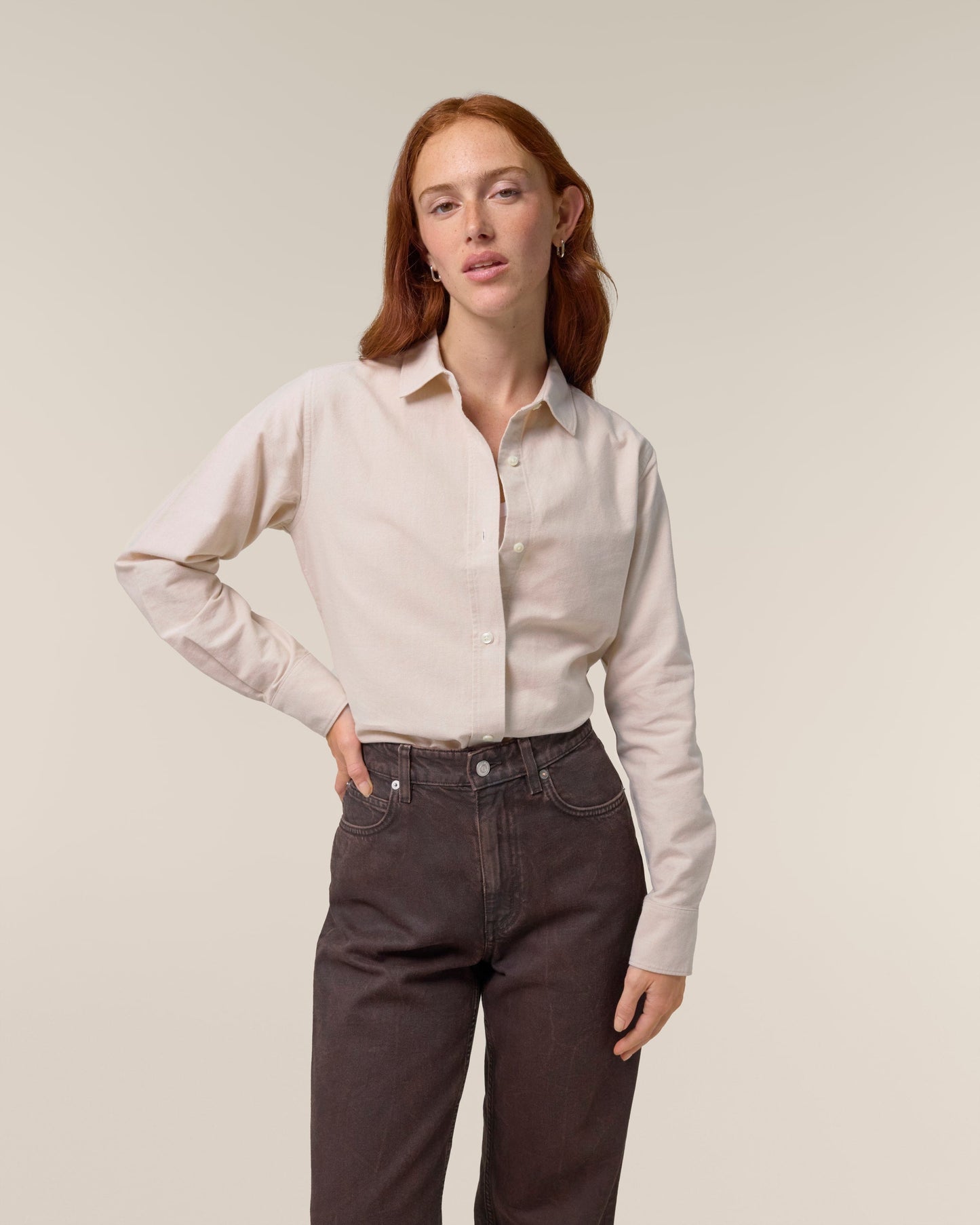 Organic Cotton Oxford Long Sleeve Shirt: Womens worn by a model, showcasing a feminine fit and comfortable style.