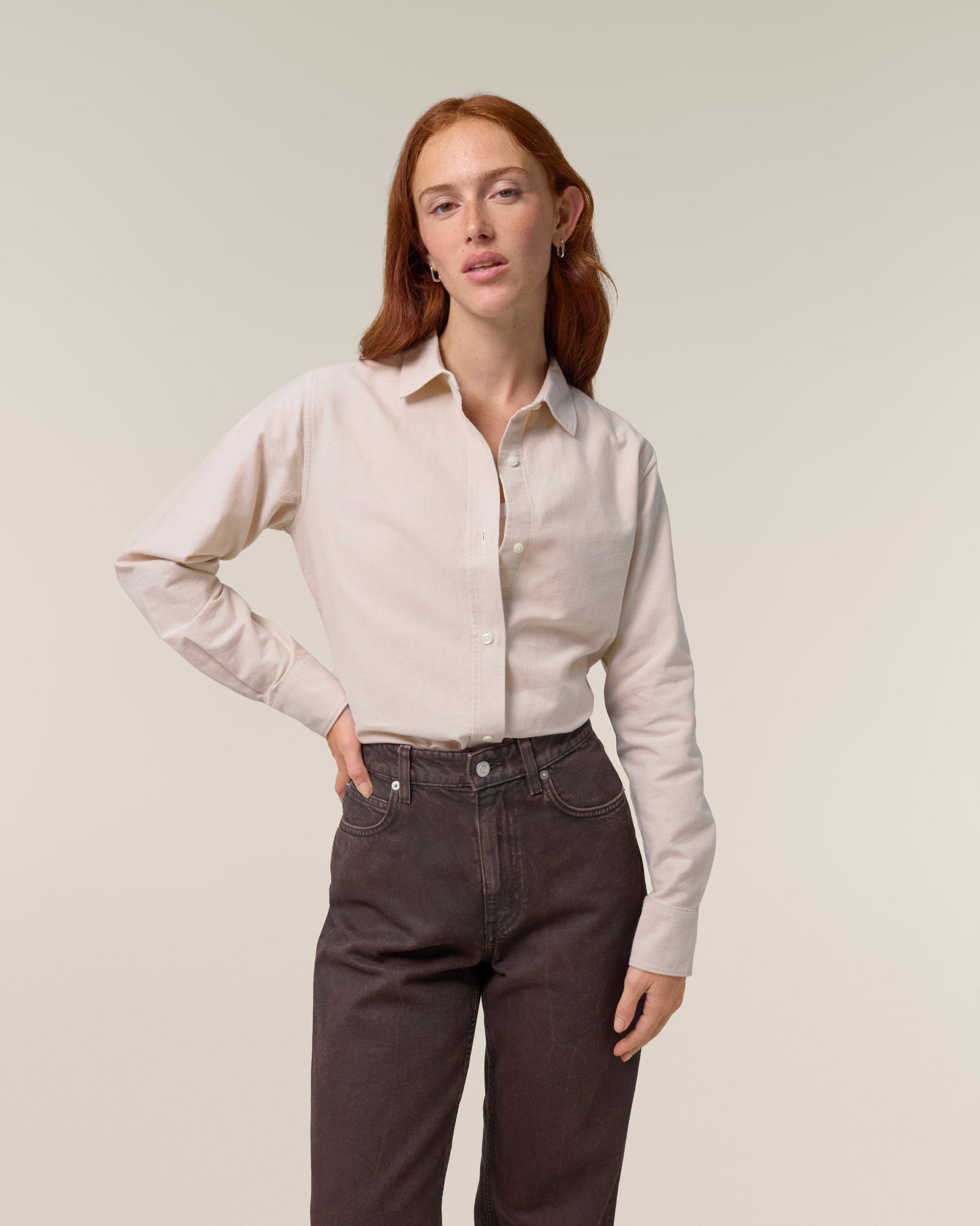 Organic Cotton Oxford Long Sleeve Shirt: Womens worn by a model, showcasing a feminine fit and comfortable style.