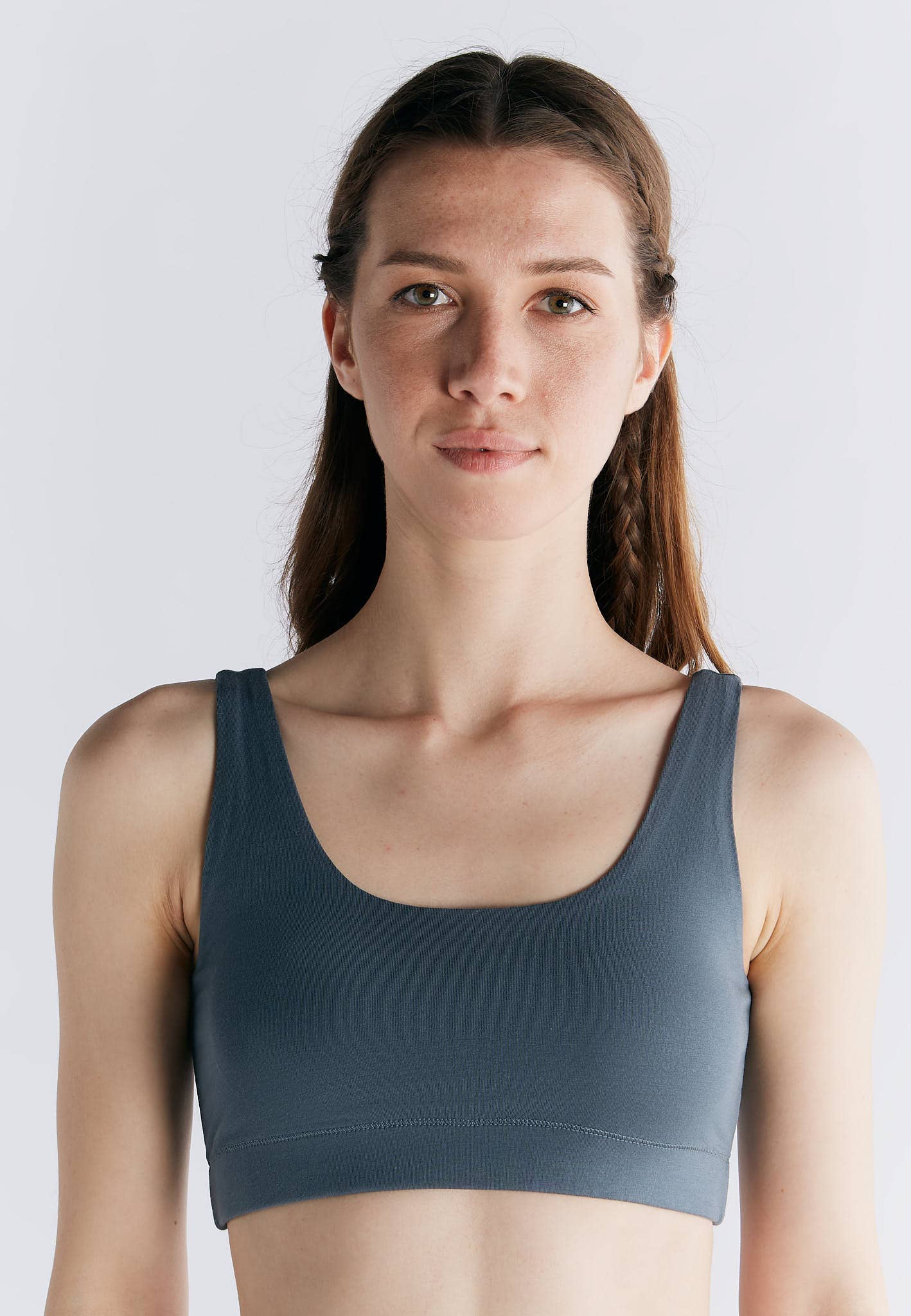Organic Cotton Padded Bralette worn by a model, featuring a slim silhouette and broad straps for comfort.