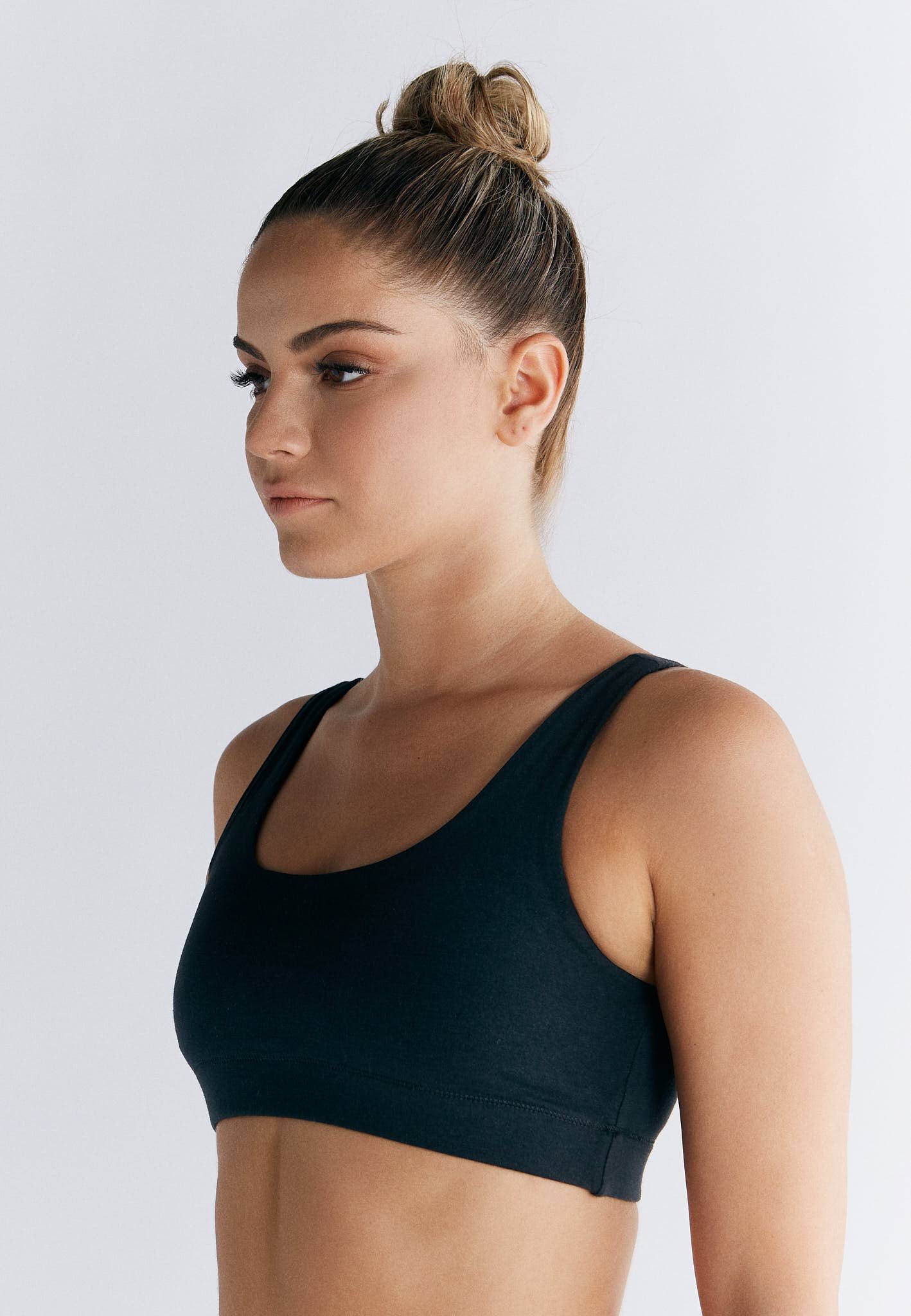 Model wearing Organic Cotton Padded Bralette showcasing its slim silhouette and comfortable fit.