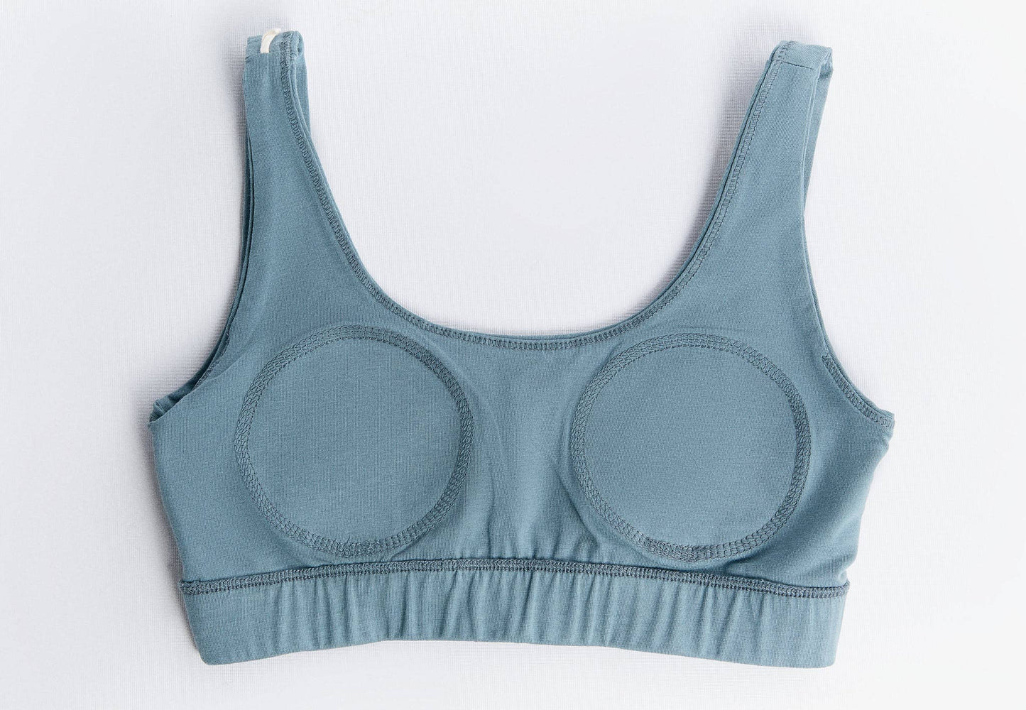Organic Cotton Padded Bralette in a soft blue color, featuring wide straps and a supportive design for all-day comfort.