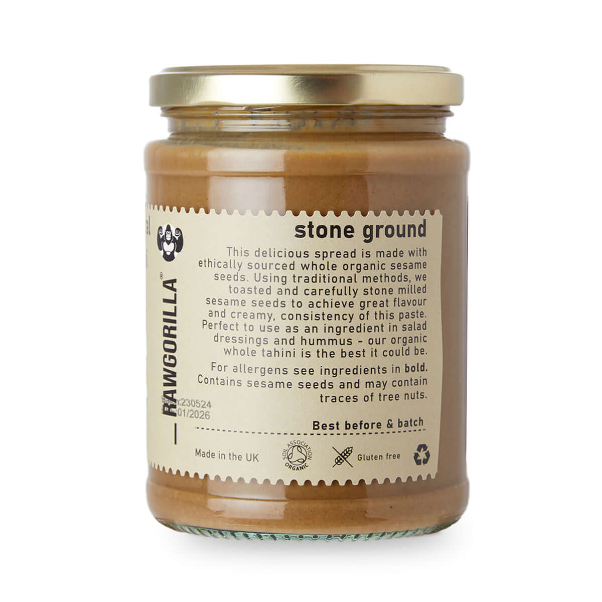Jar of Rawgorilla tahini with a gold lid on a white background