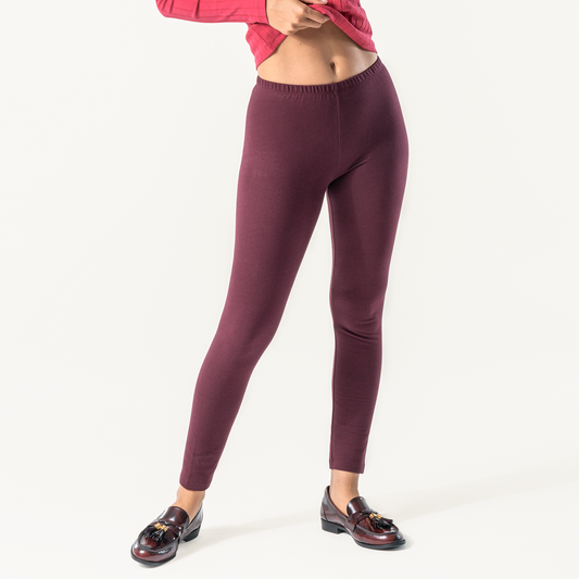 Organic Stretch Fleece Leggings: Womens in burgundy color, featuring a slim-fit silhouette and high-rise waistband.