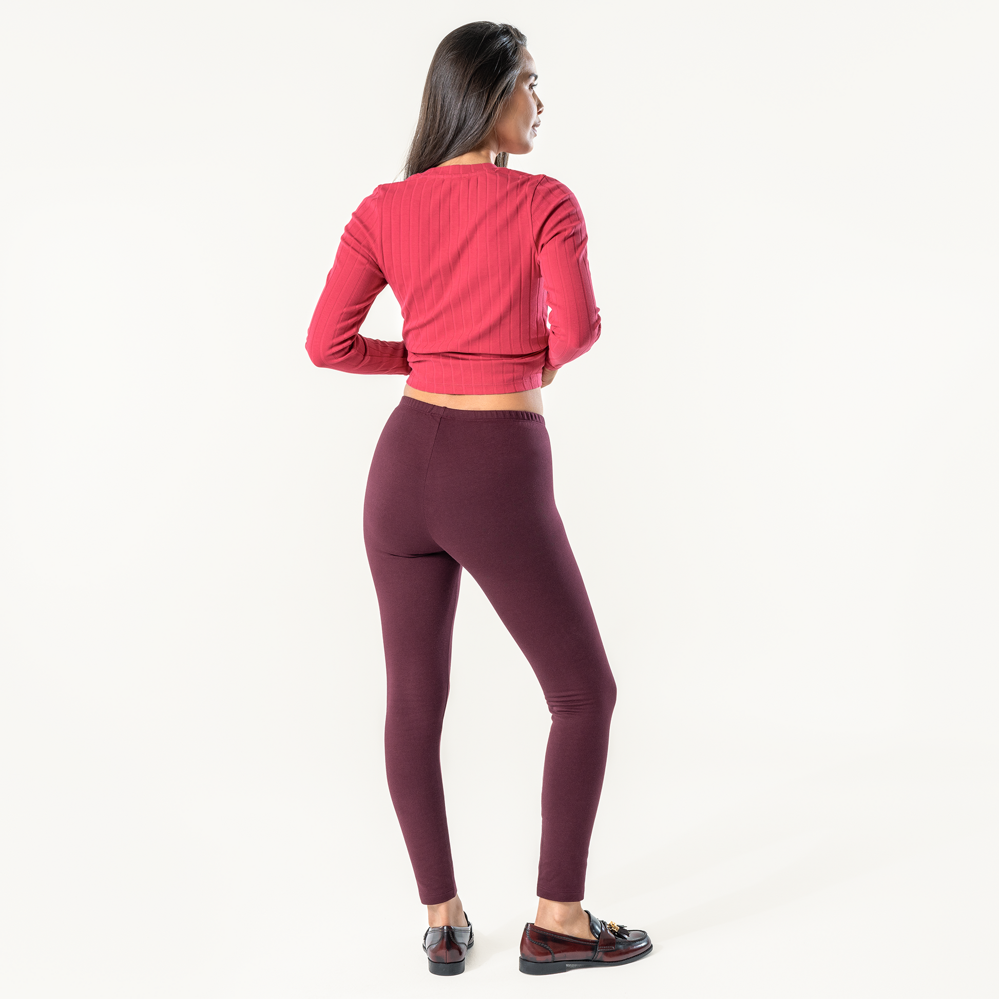 Organic Stretch Fleece Leggings: Womens in maroon, showcasing a slim-fit silhouette and high-rise waistband.
