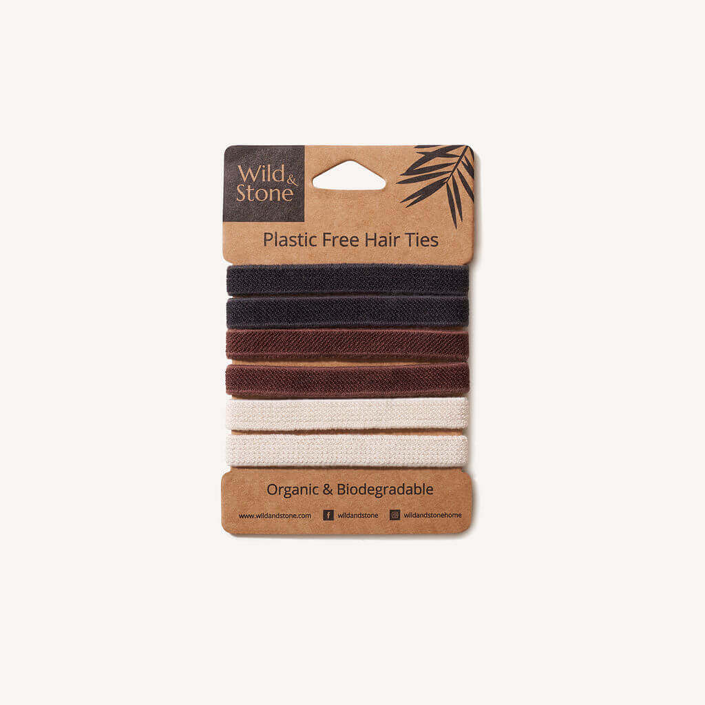 Pack of plastic-free hair ties with visible brand 'Wild & Stone' on a white background