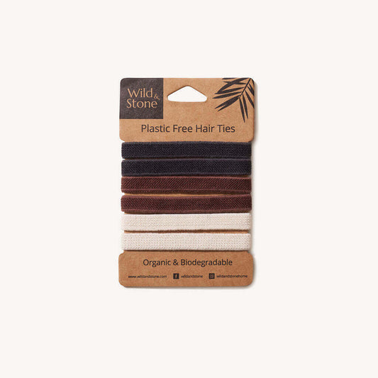 Pack of plastic-free hair ties with visible brand 'Wild & Stone' on a white background