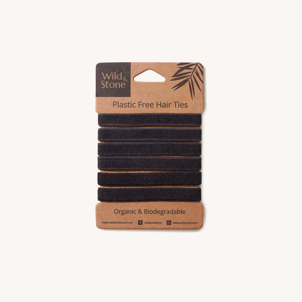 Pack of black hair ties with a 'Wild & Stone' label on a white background