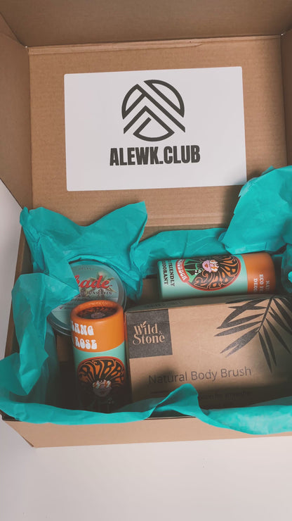 Eco Essentials Home Gift Set featuring bamboo toothbrushes, natural body brush, Ylang & Rose soap bars, and Shade all-natural sunscreen, arranged on a neutral background for a minimalist, sustainable lifestyle look