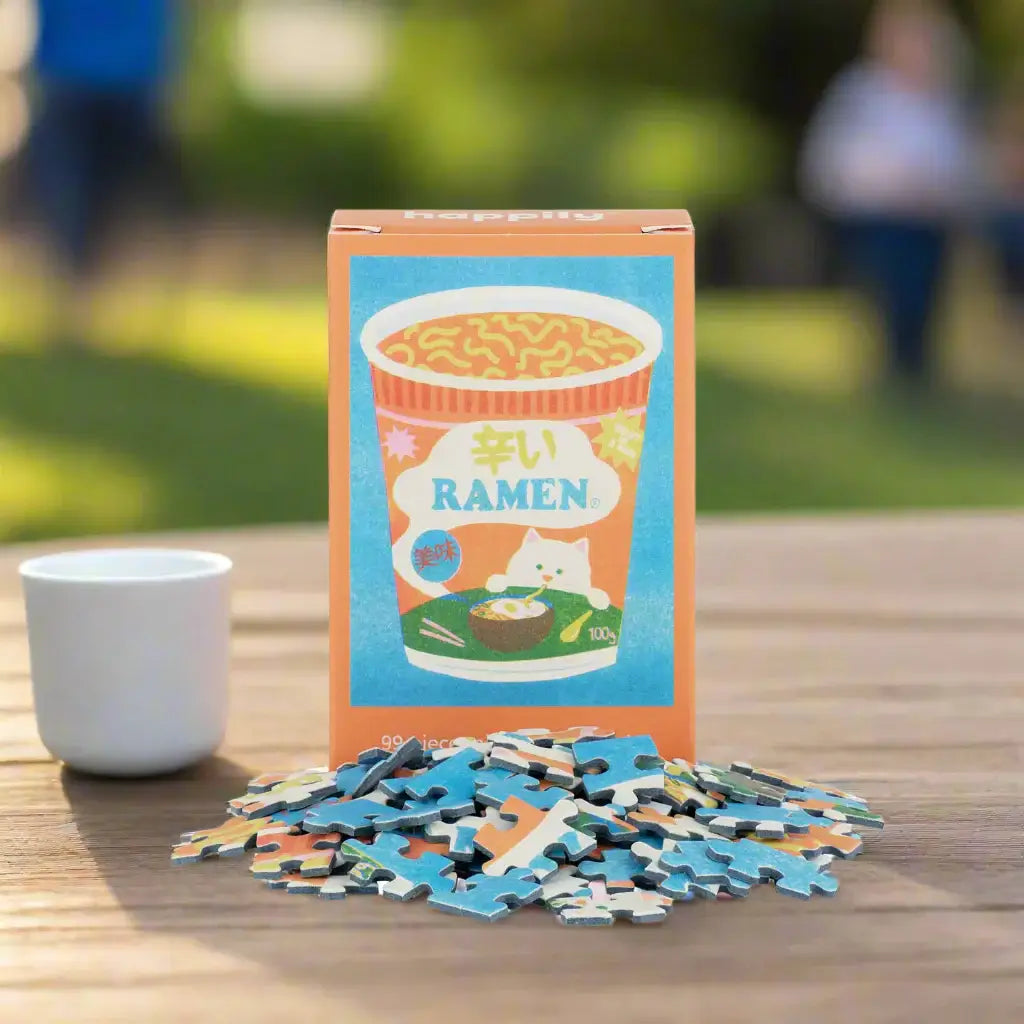 Ramen-themed puzzle with pieces and packaging on a white background