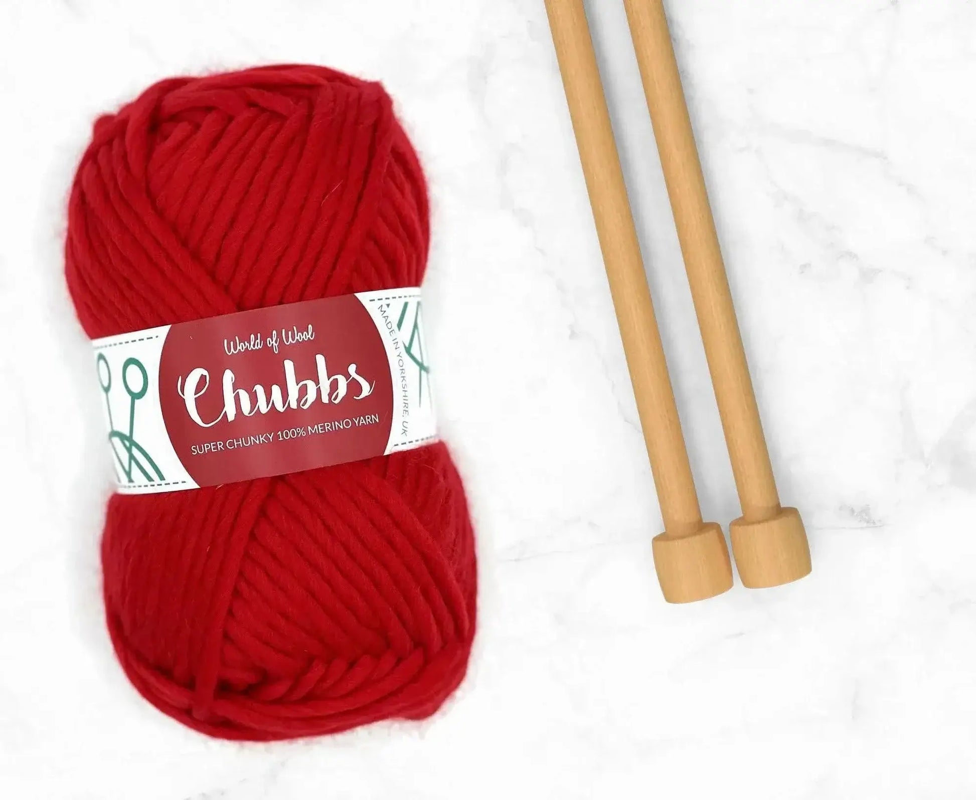 Scarlet Merino Super Chunky Weight yarn in royal red, soft and perfect for crafting projects.