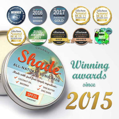Organic Shade sunscreen tin with multiple awards displayed on a white background
