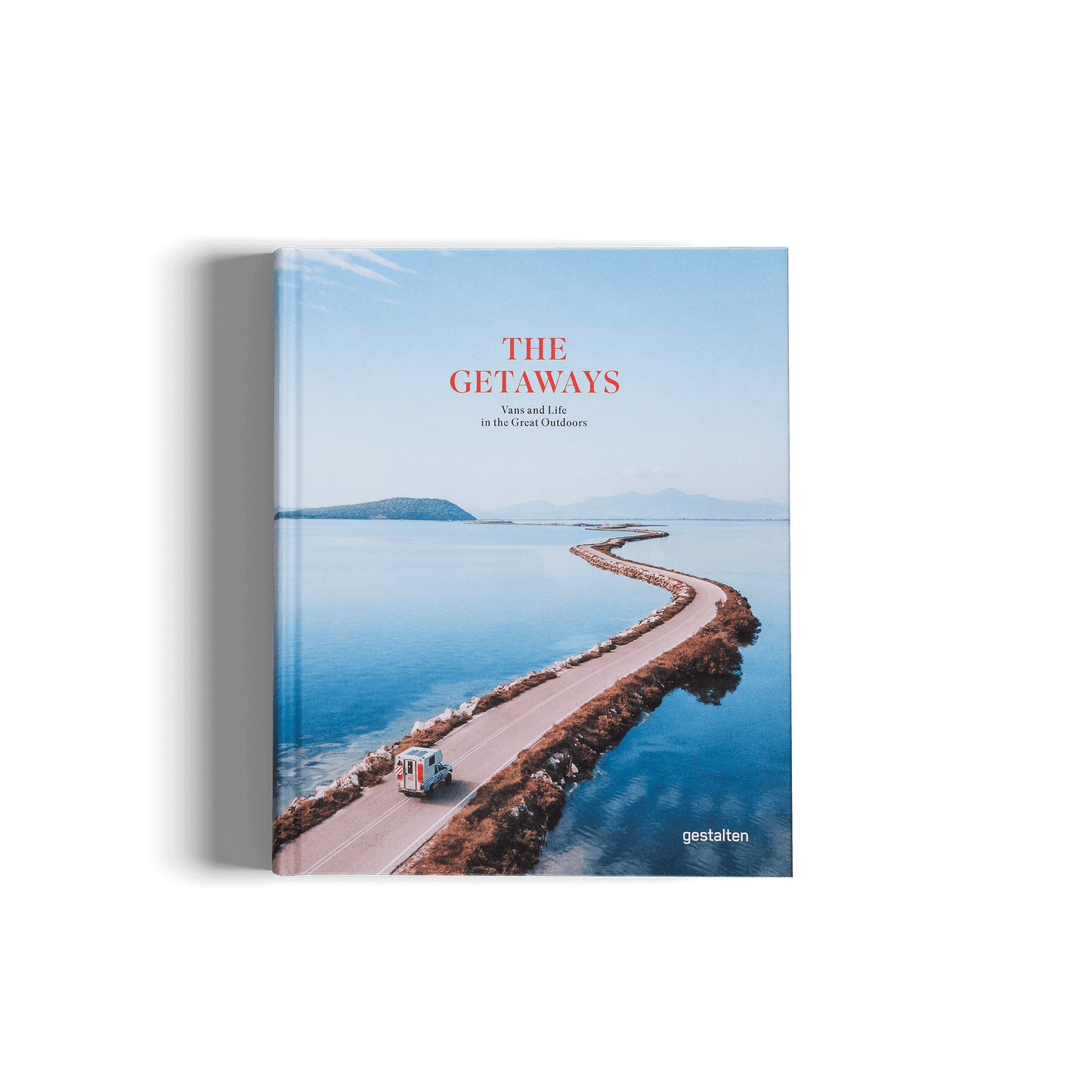 Book titled 'The Getaways' with a scenic cover featuring a road by the water.