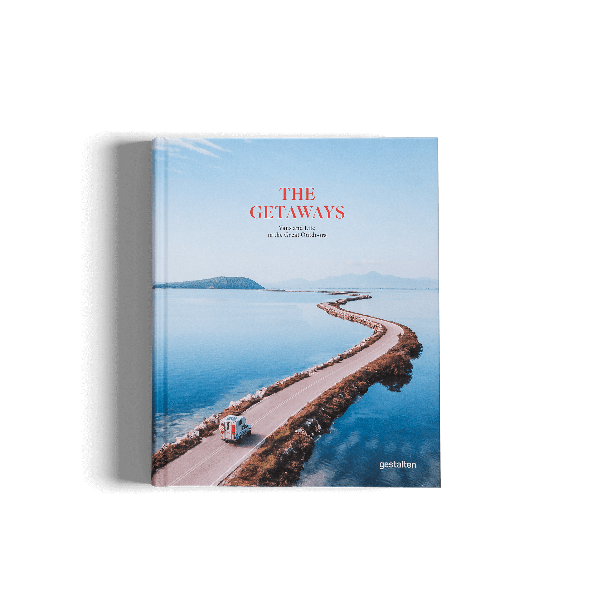 Book titled 'The Getaways' with a scenic cover featuring a road by the water.