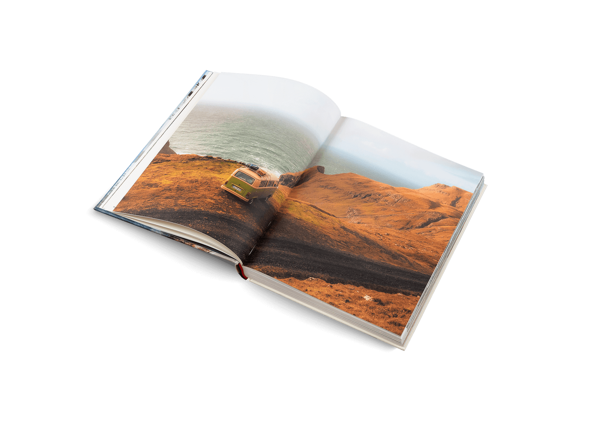 Open book displaying a scenic landscape with a house on an island.