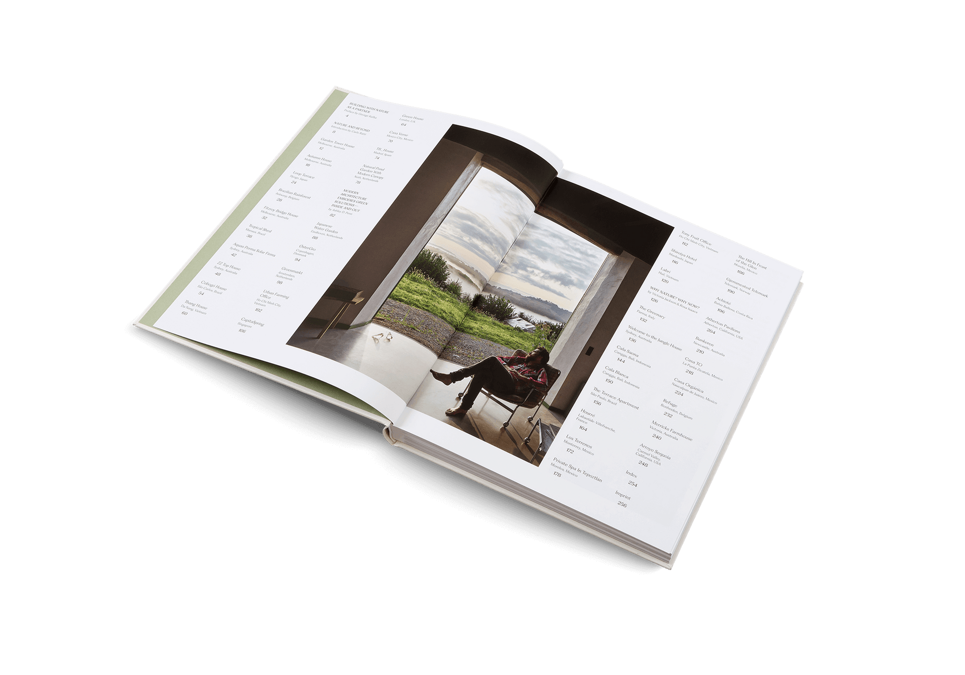 The House of Green - Explore Biophilic Architecture book opened to a stunning nature view.