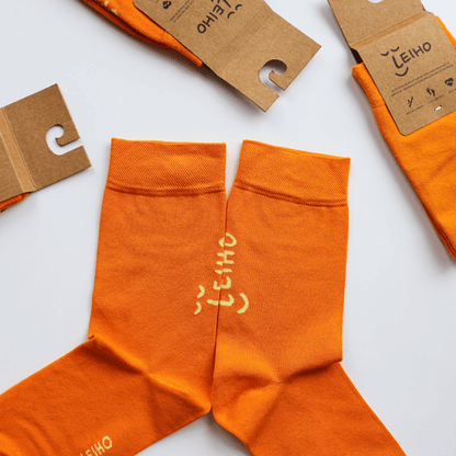 Unisex Orange Leiho Street Style Bamboo Socks from Eco-Friendly-Online-Shop, offering breathable, ethically made footwear for everyday comfort.