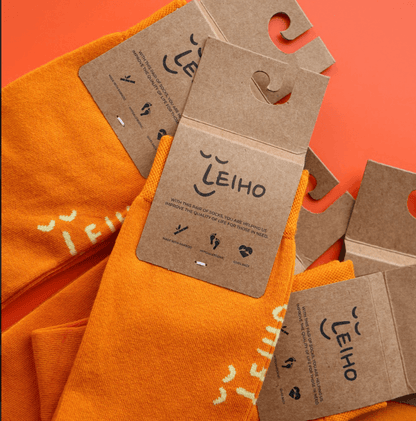Unisex Orange Leiho Street Style Bamboo Socks from Eco-Friendly-Online-Shop, offering breathable, ethically made footwear for everyday comfort.