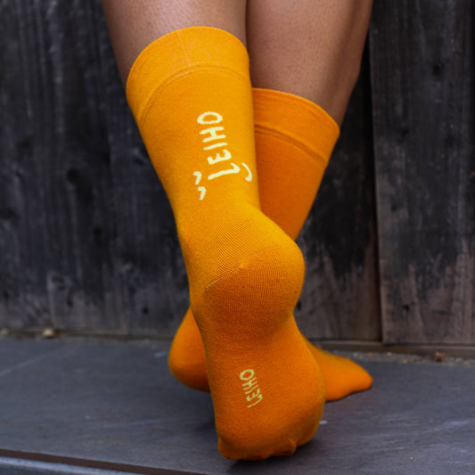 Unisex Orange Leiho Street Style Bamboo Socks from Eco-Friendly-Online-Shop, offering breathable, ethically made footwear for everyday comfort.