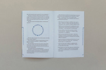 Open book with text on a beige background