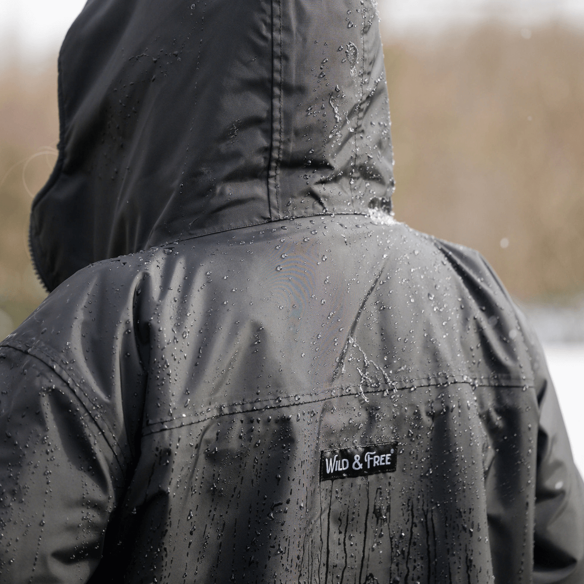 Raincoat & Changing Robe in One - The Classic Cobe Black, waterproof and stylish for all seasons.