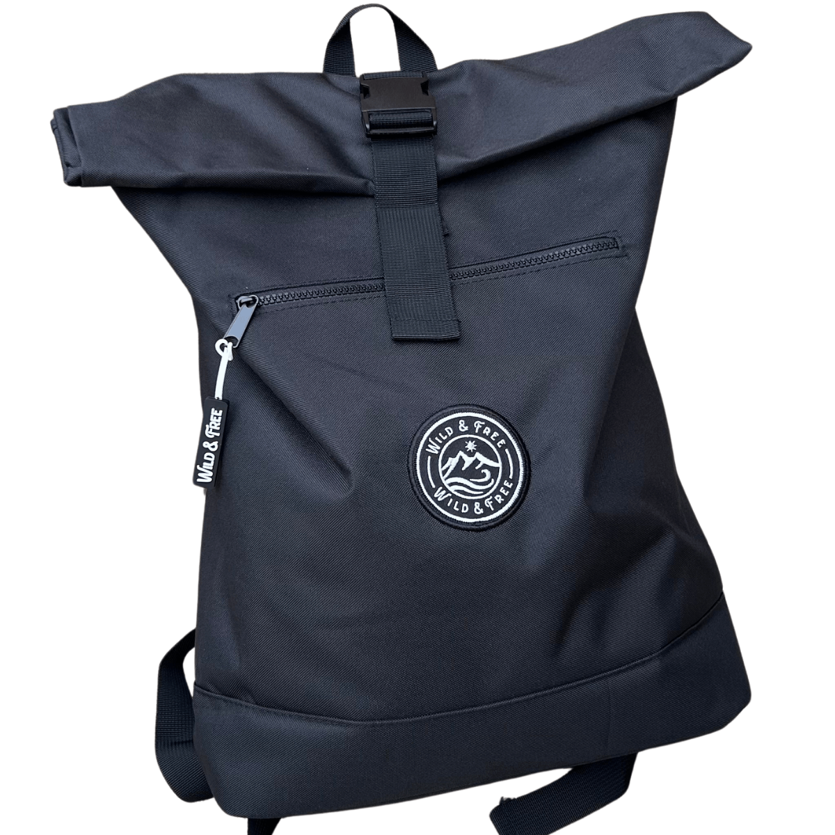 The Backpack from Wild & Free, 20L rolled top backpack in black, perfect for adventures, shop at Alewk.club.