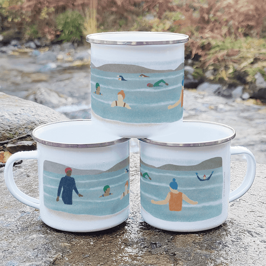 Wild Swimming Enamel Mug featuring playful swimmers taking a dip in refreshing water.