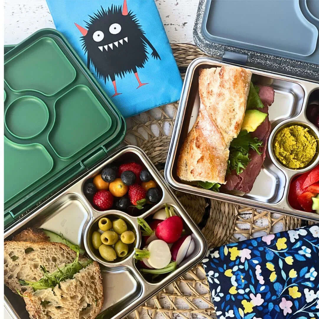 Yumbox Prêt Stainless Steel Leakproof Bento Lunch Box - Various Colours filled with a sandwich and fruits.